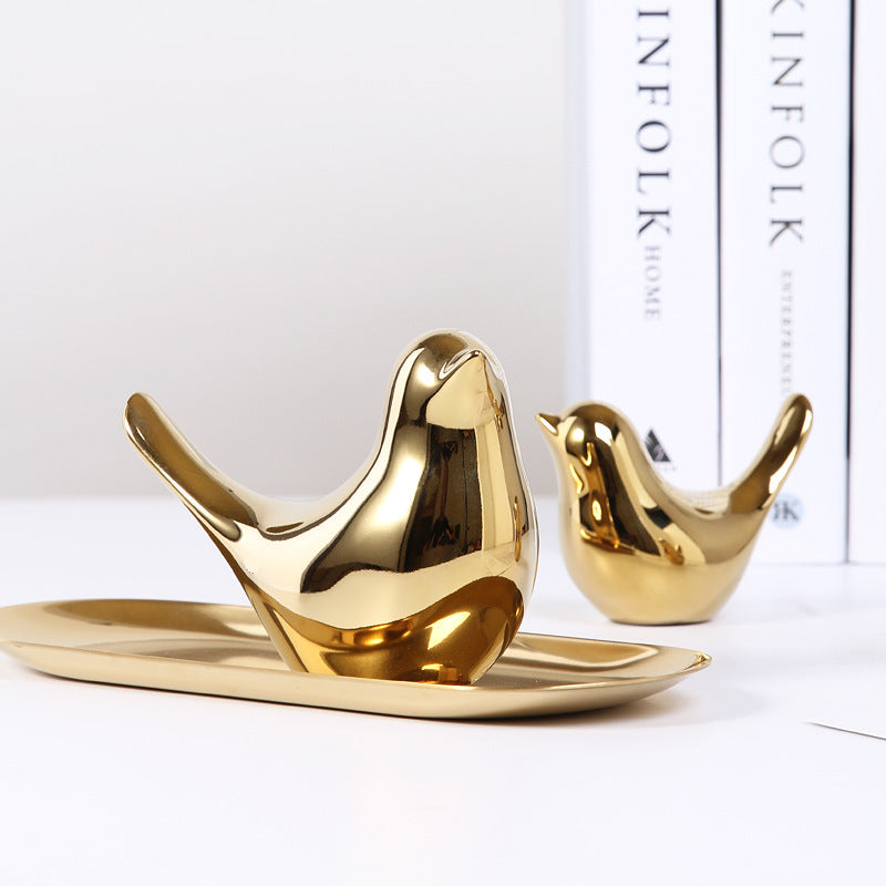 Noords gouden keramiek vogelornament