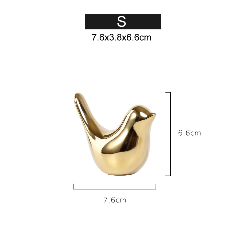 Noords gouden keramiek vogelornament