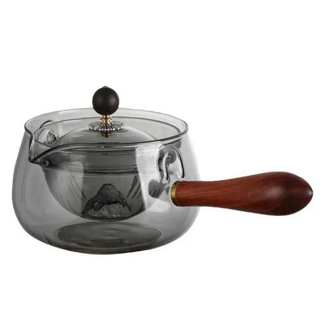 Draaiende glazen theepot met infuser