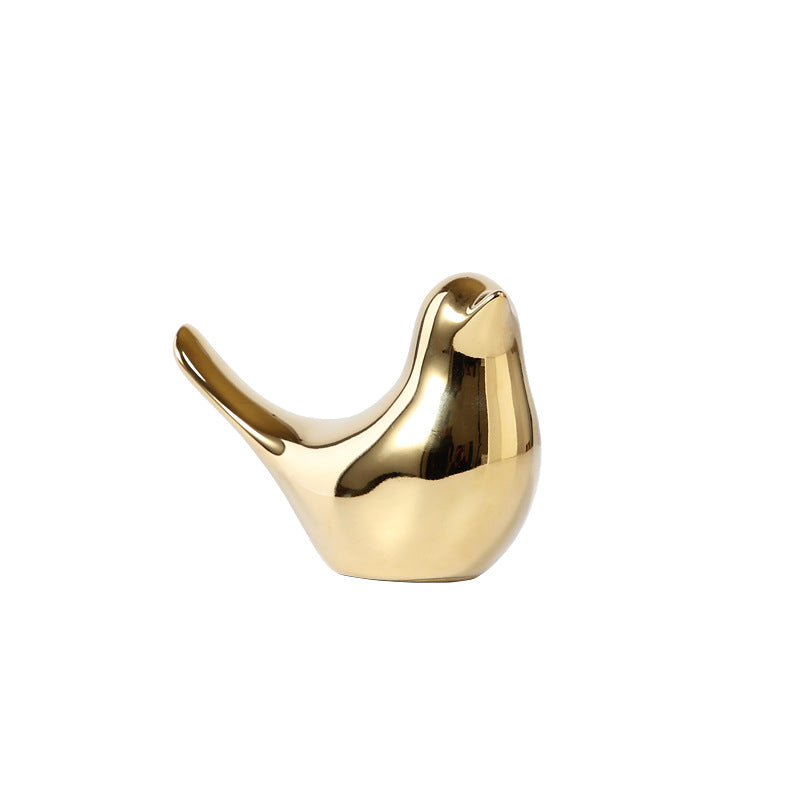 Noords gouden keramiek vogelornament