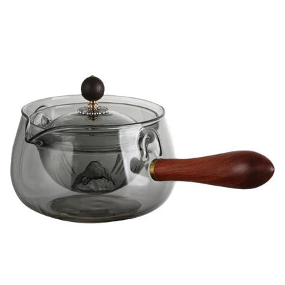 Draaiende glazen theepot met infuser