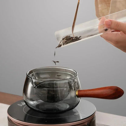Draaiende glazen theepot met infuser